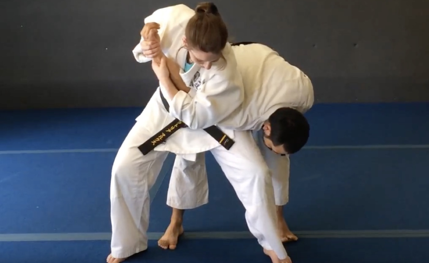 Partner throw practice in the dojo