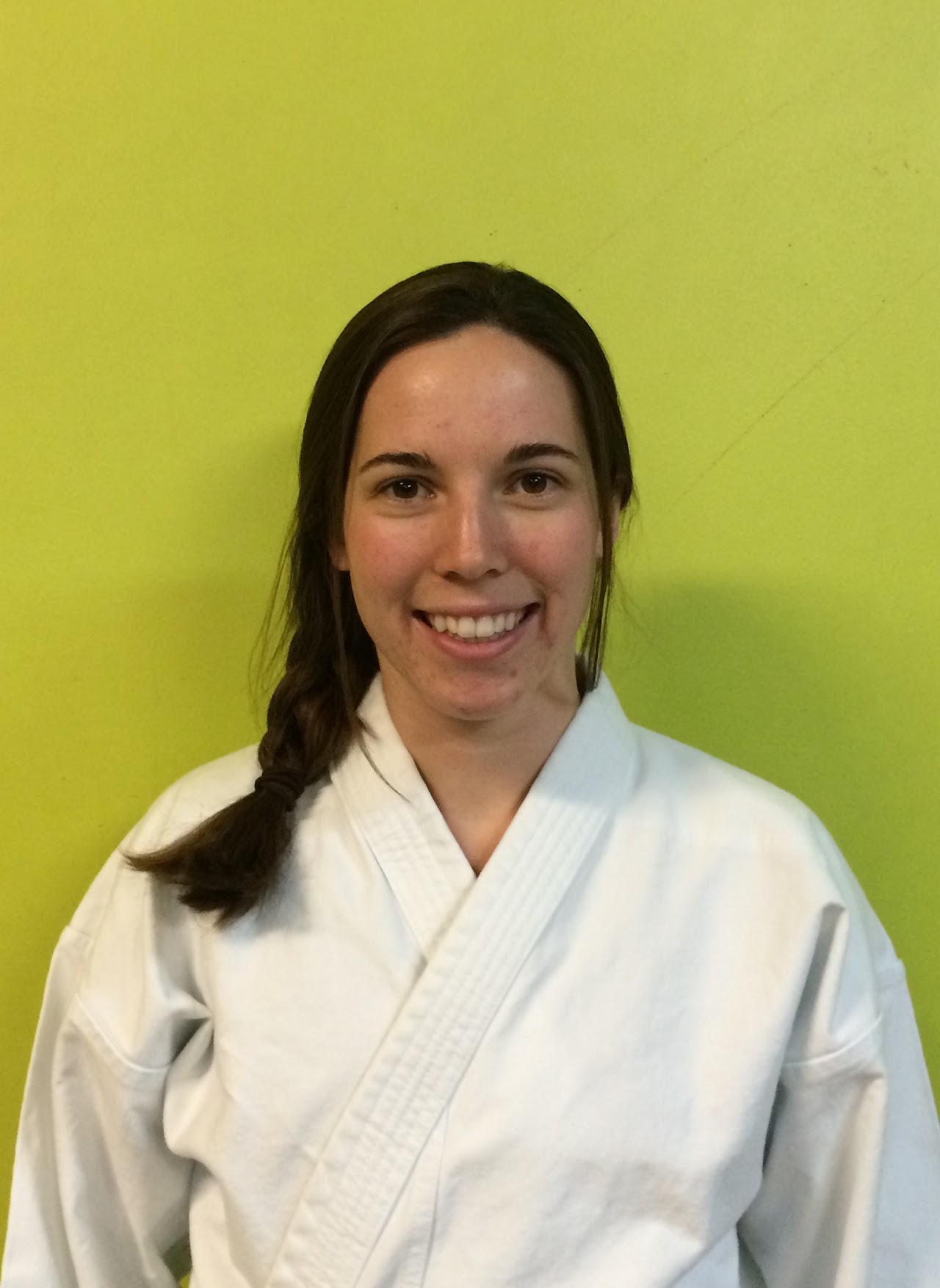 Emily Kemp in a white karate gi