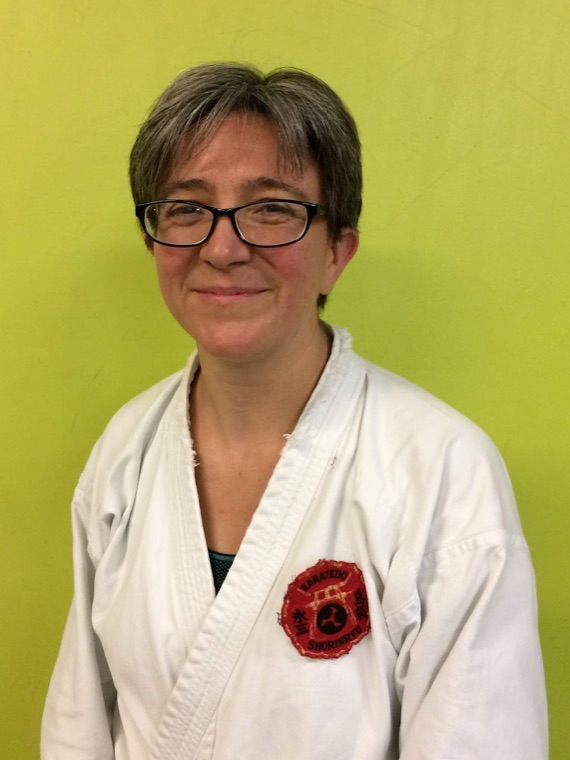 Jen Collins in a white karate gi